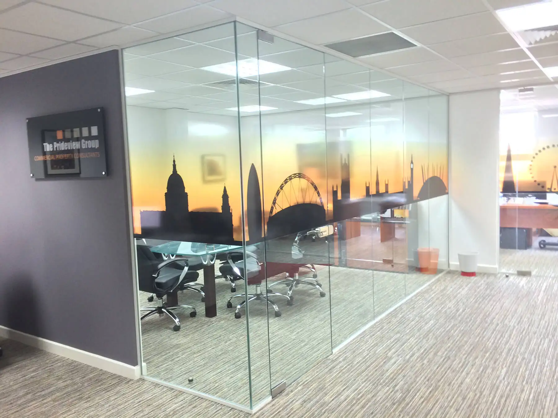 Designer flooring in office with glass partitioning