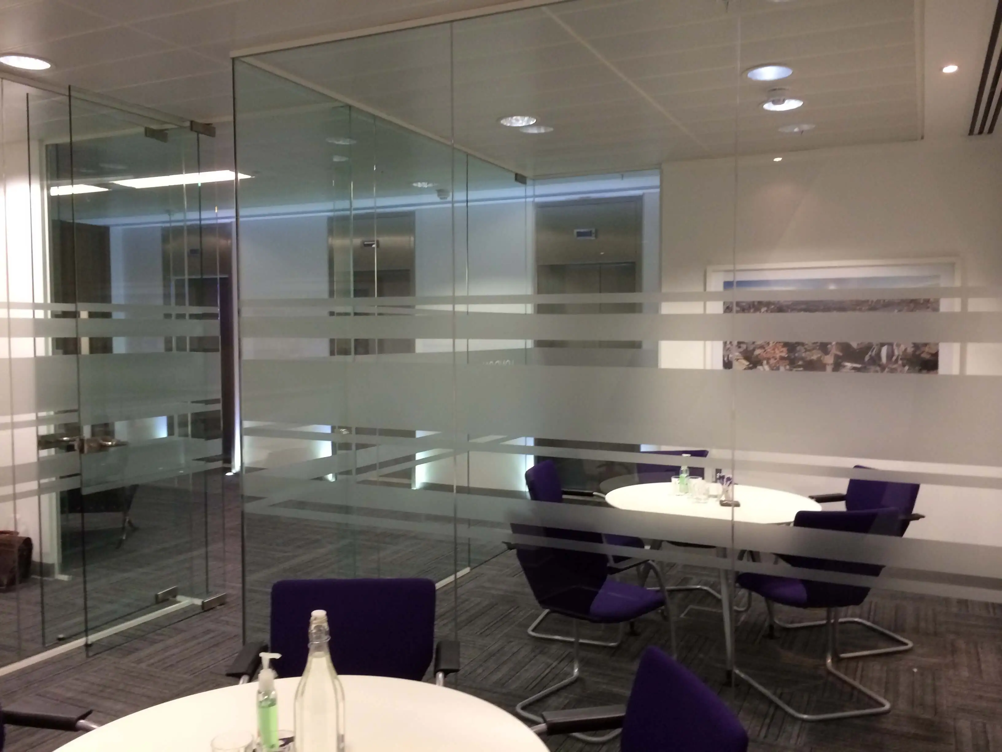 Designer glass walls to divide office spaces