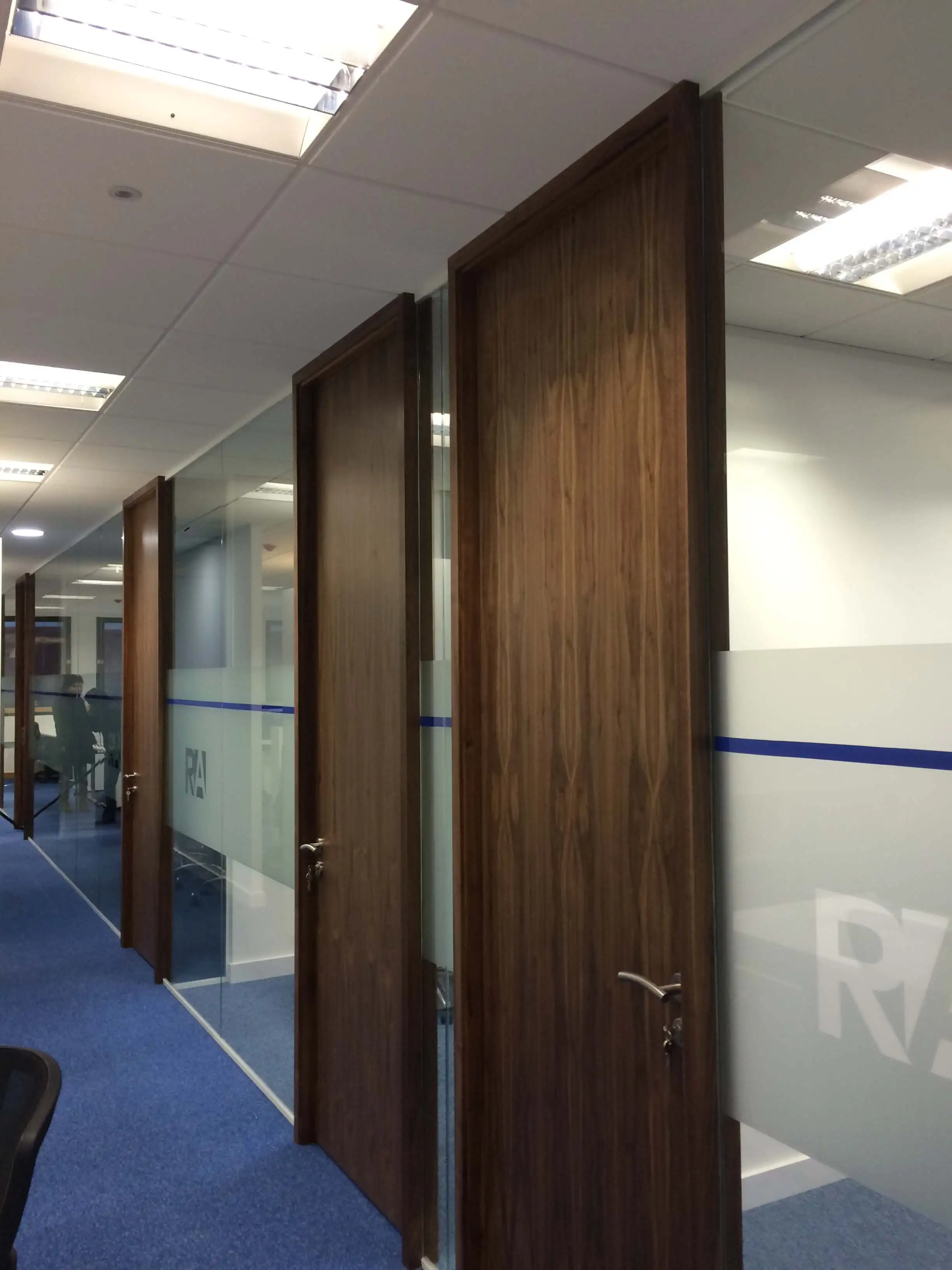 Gadd House office spaces with glass partitions with solid doors