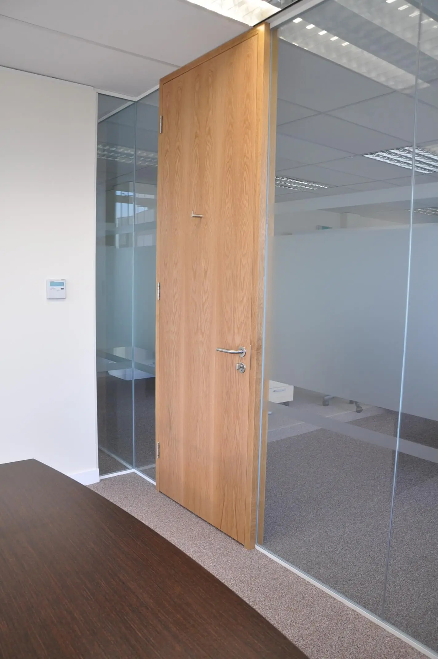 Full height solid doors with glass partitions
