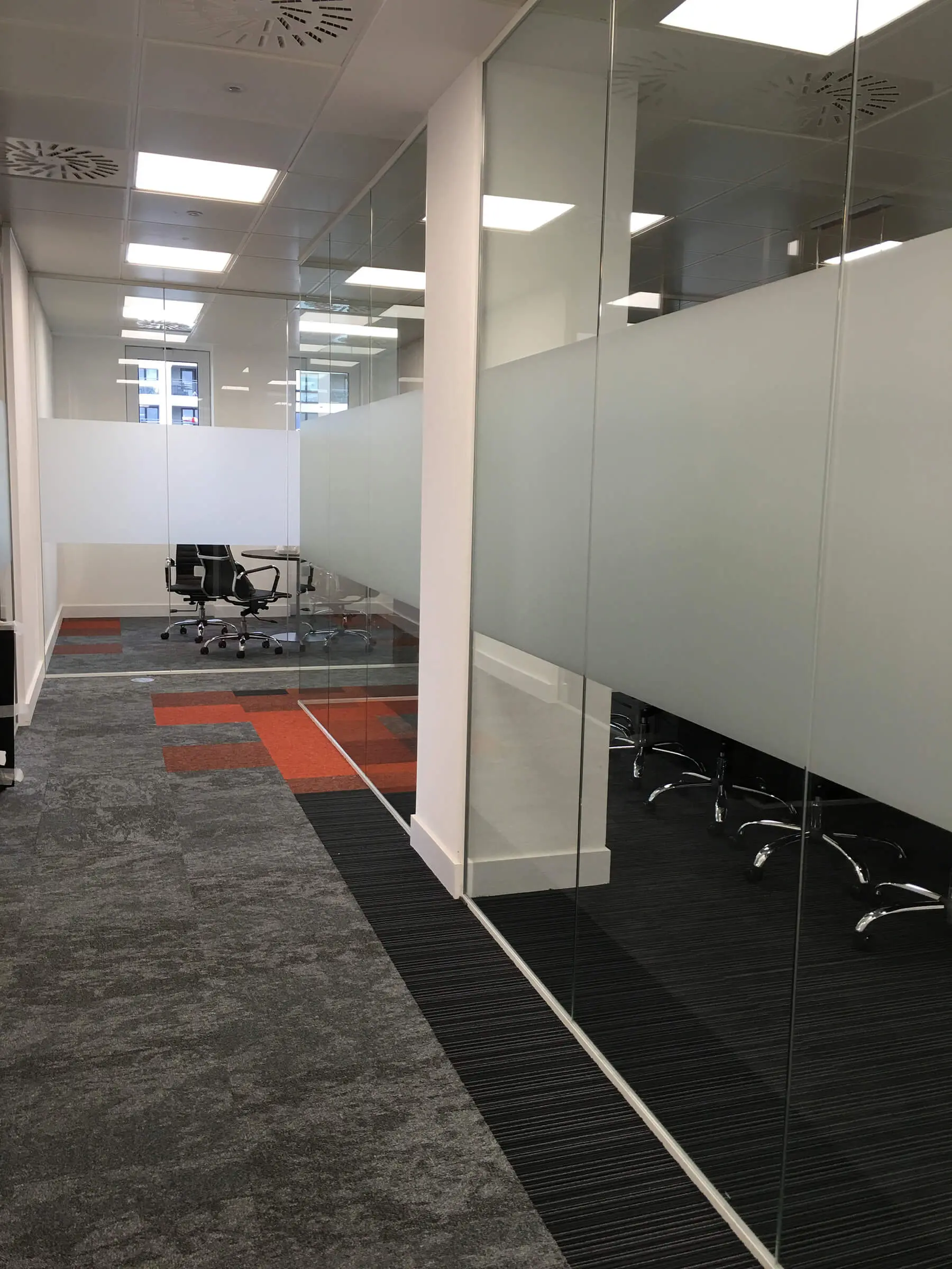 Glass partitions with manifestation