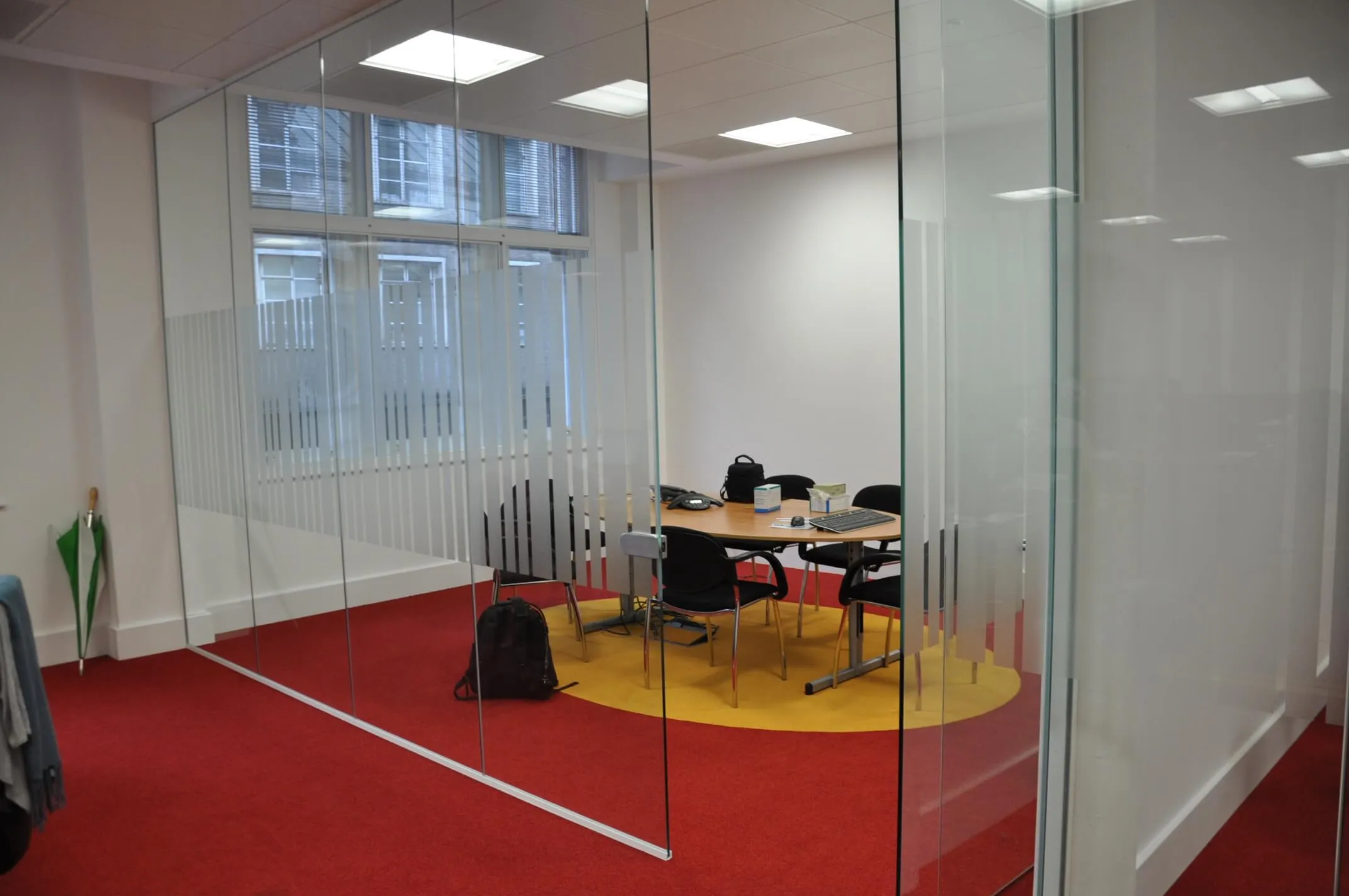 Intuition office meeting space in glass partitions with designer manifestation