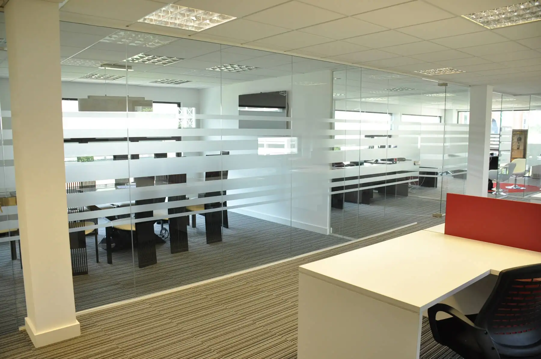 Manifested glass partitions in office space