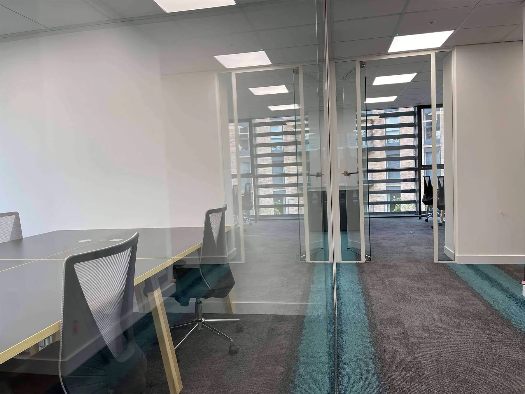 Meeting area with glass doors and walls