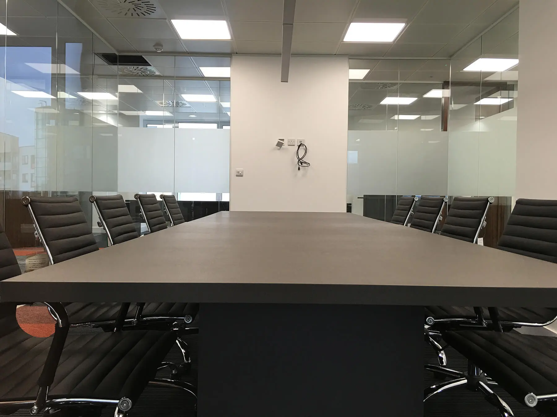 Meeting room surrounded with glass walls