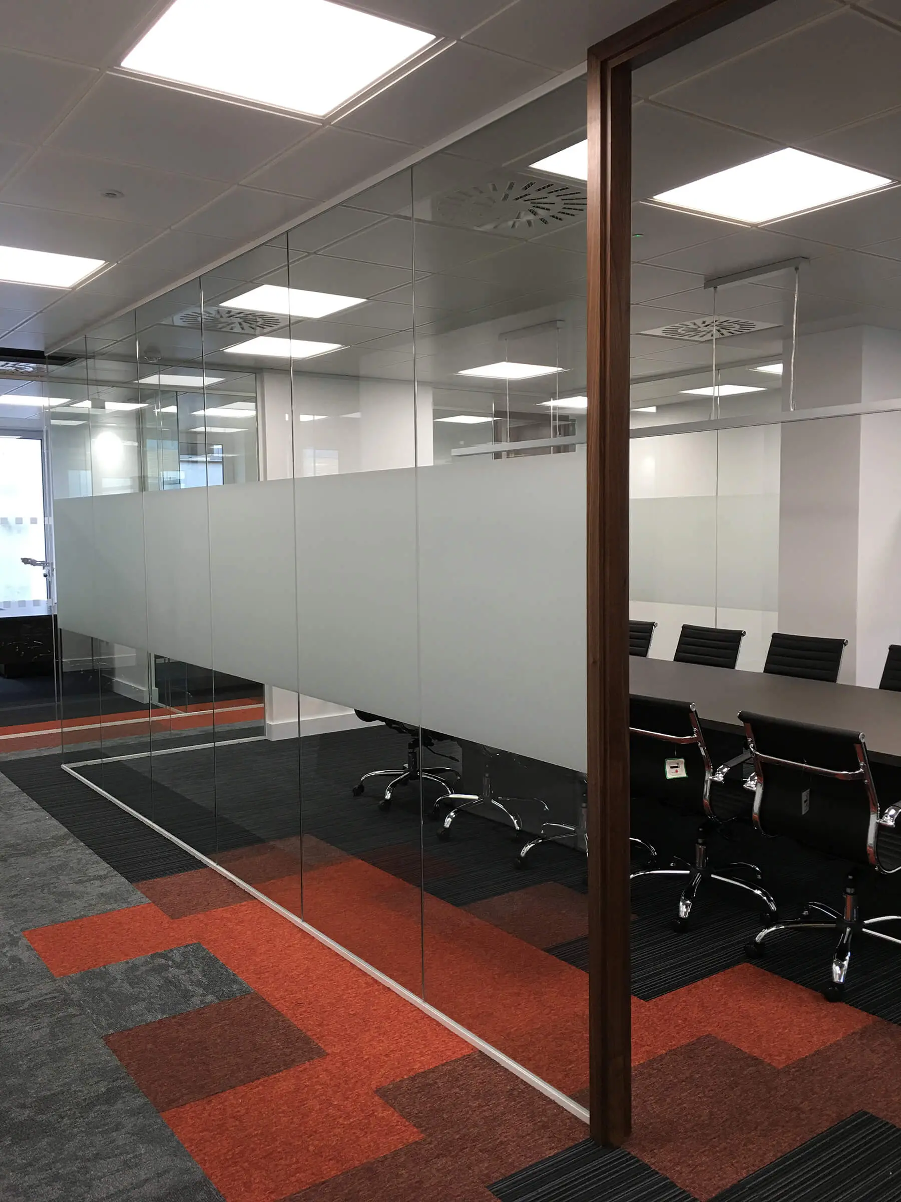 Meeting room with designer floor and glass walls
