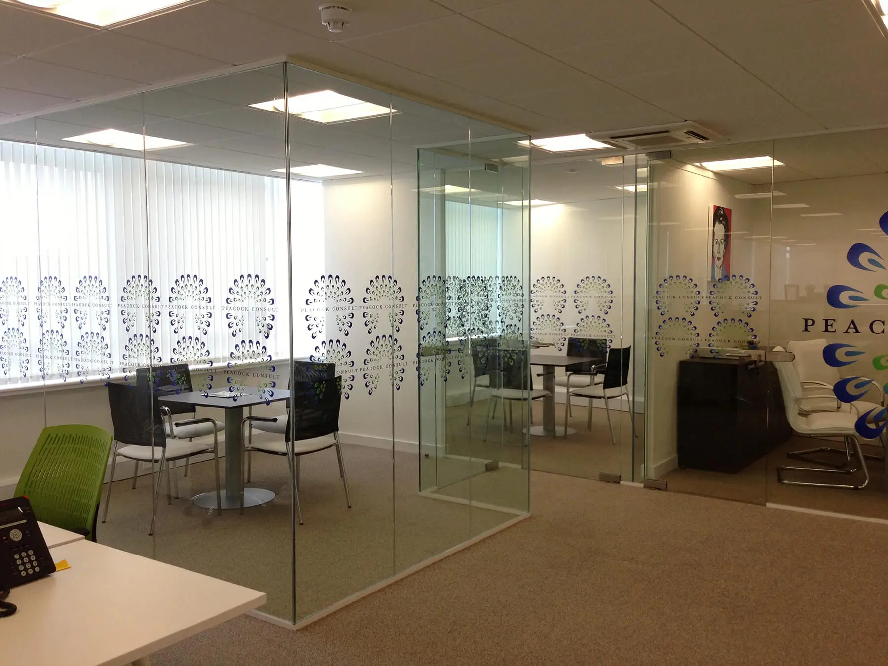 Meeting space divided with glass partitions