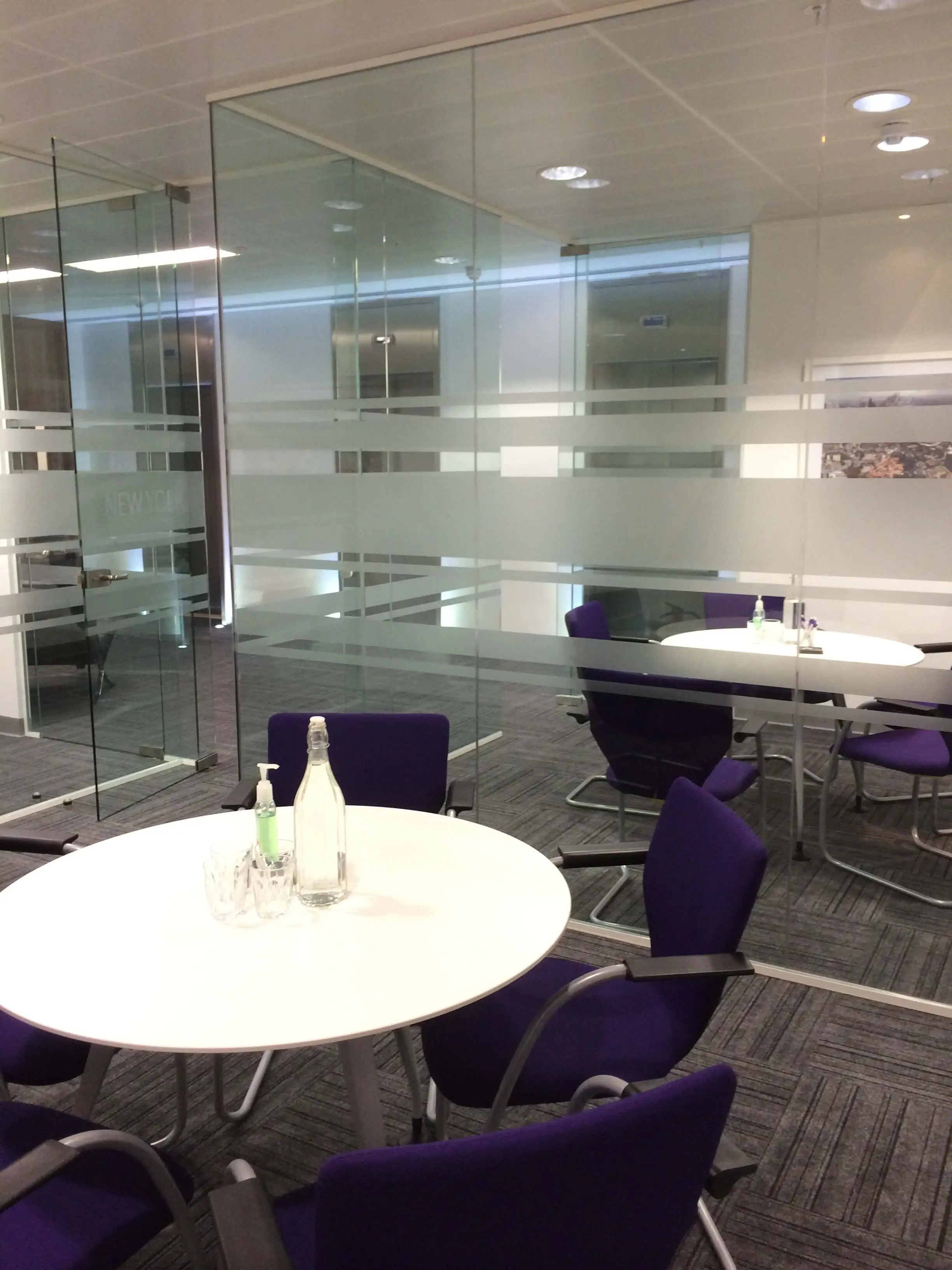 Meeting spaces divided with designer glass partitions