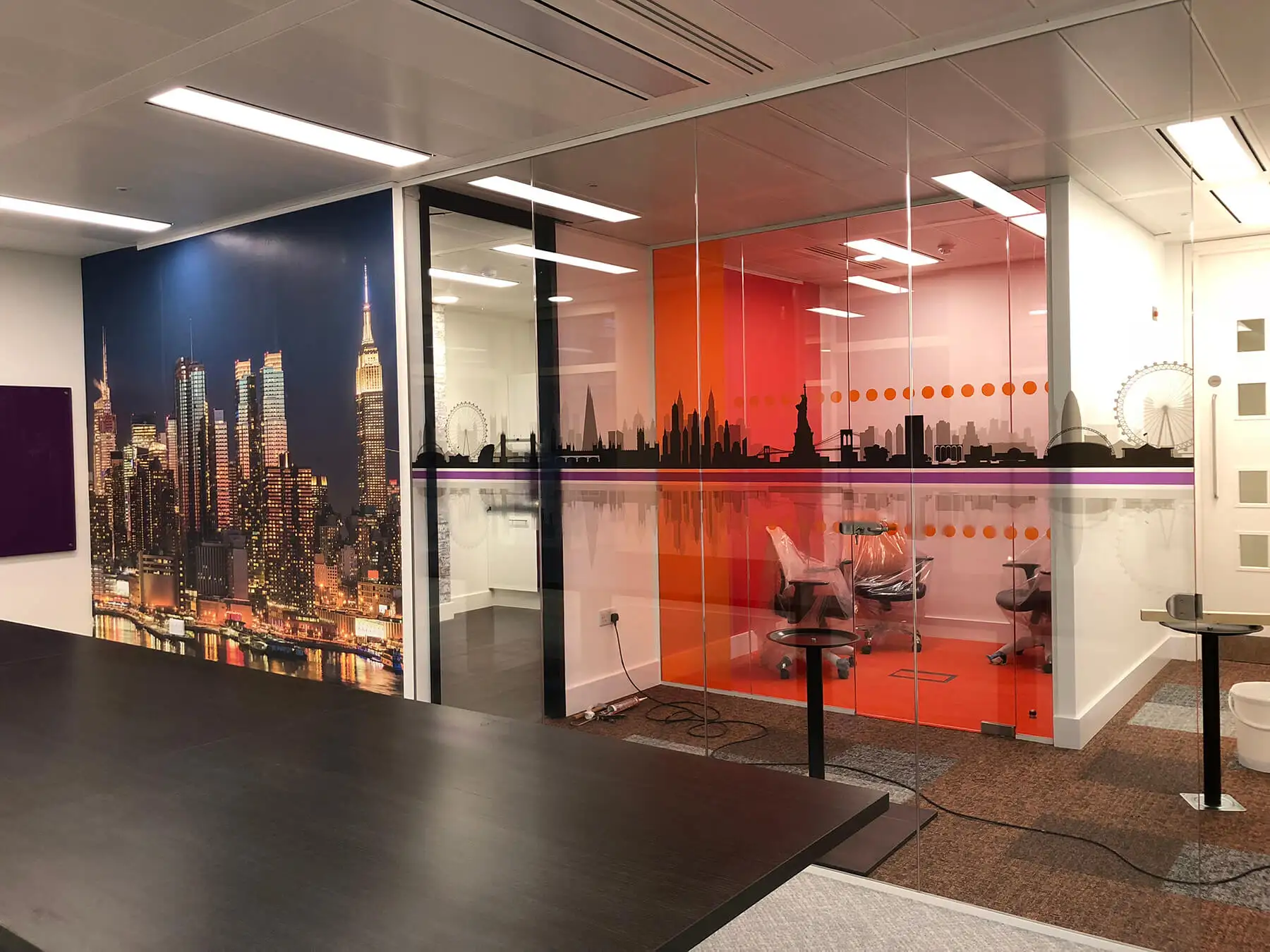 Ngage glass partitions with designer walls