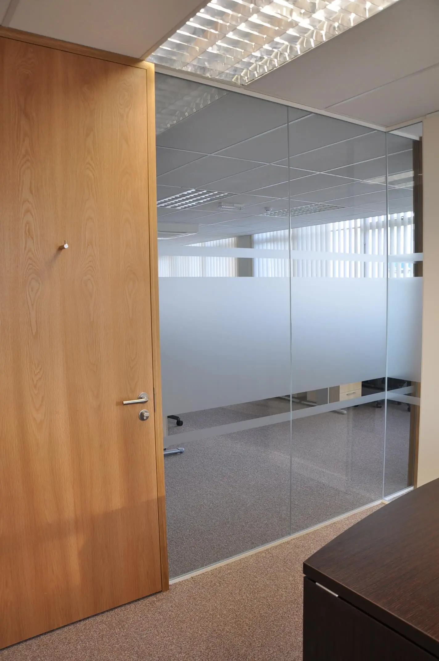 Office space glass partitiones with solid manifestation and doors