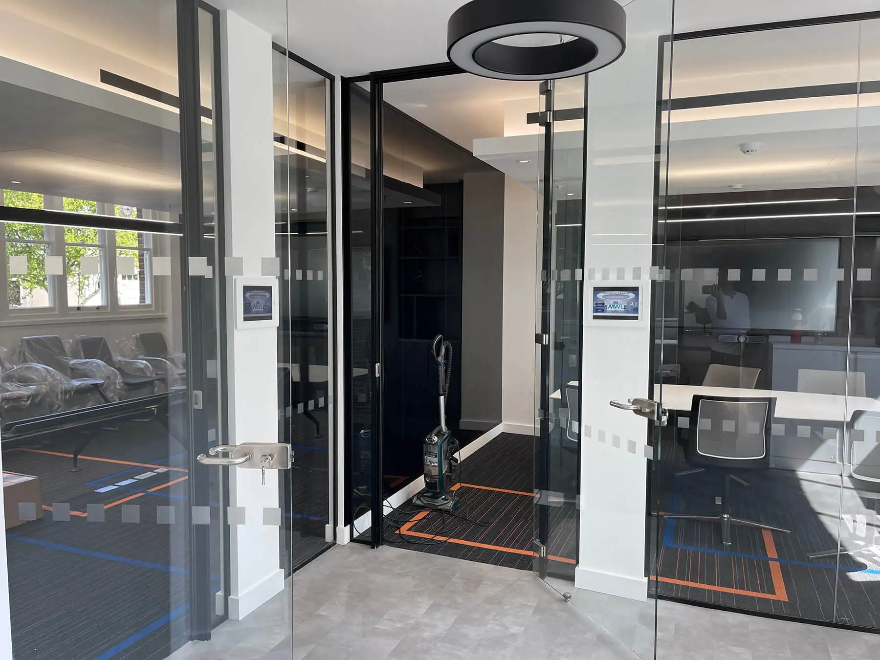 Office space with Black framed glass walls and doors