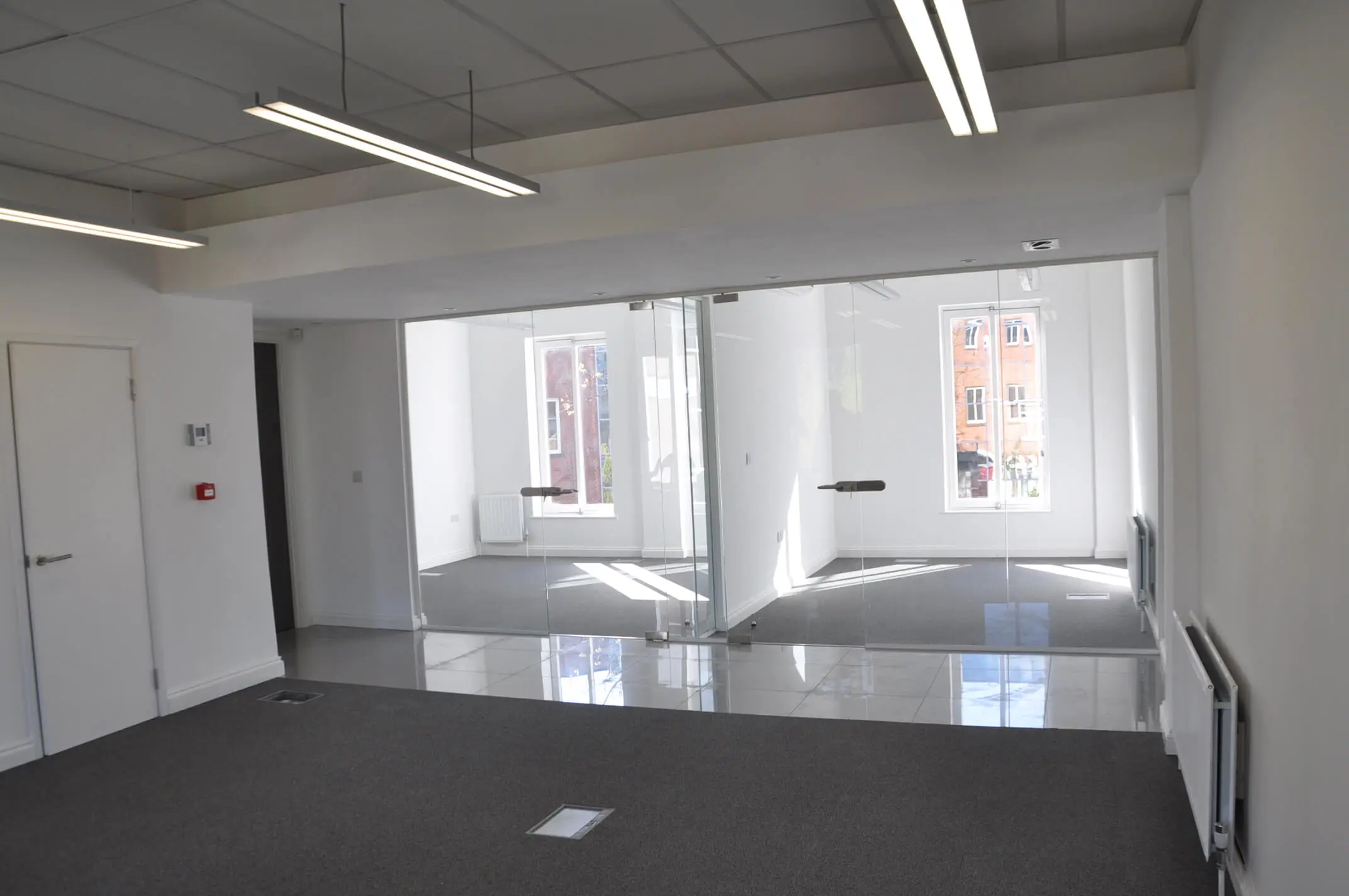Office space with frameless glass doors