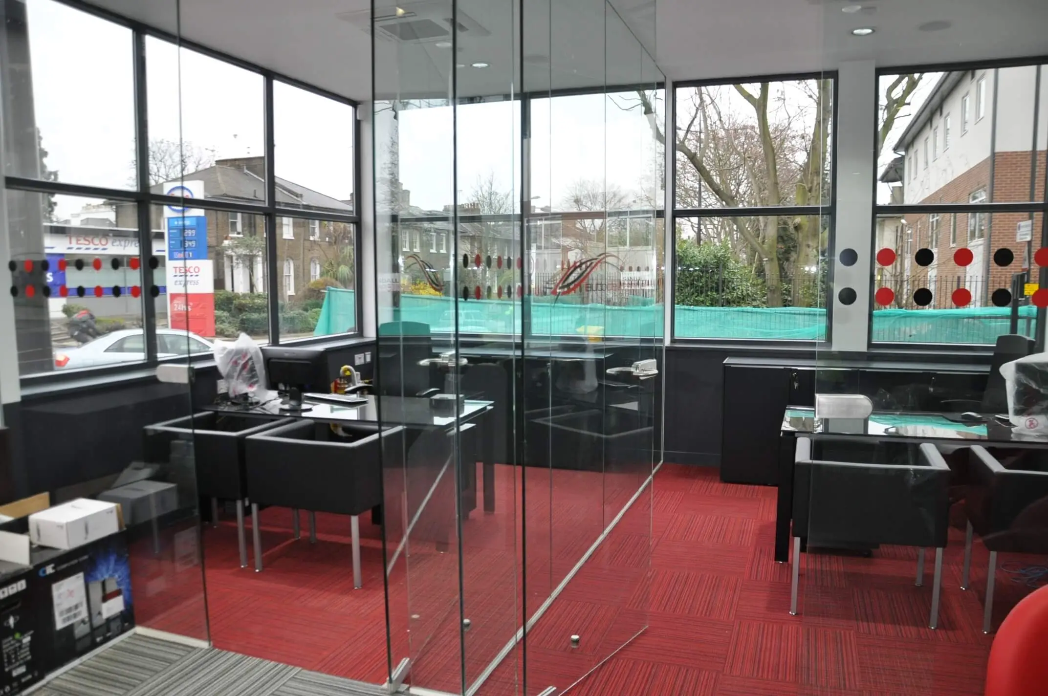Office space with glass doors and windows