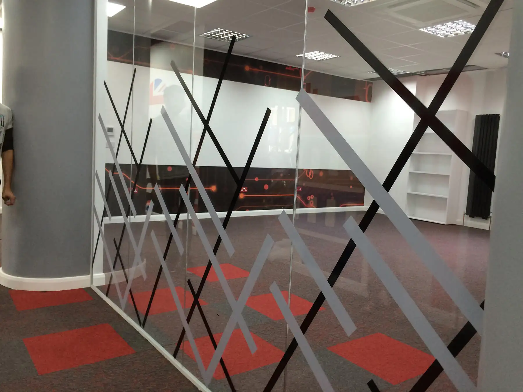 Office space with open storage and glass partitioning