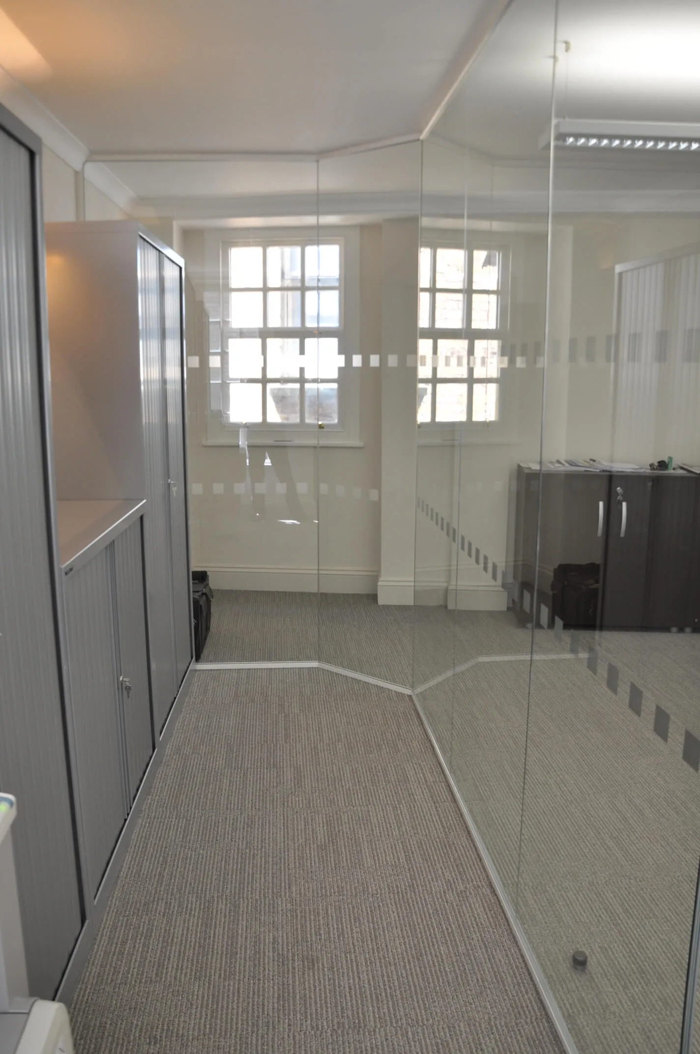 Office space with storages and glass partitions