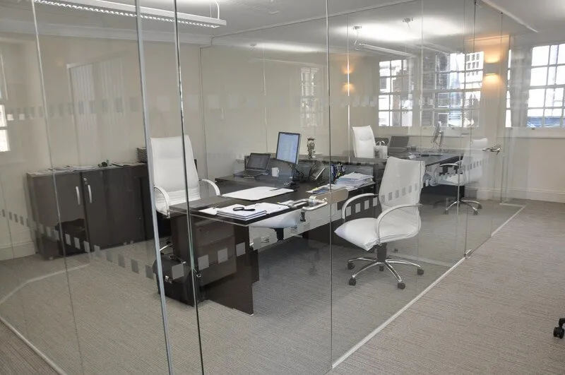 Seamless Glass Partition for Executive office