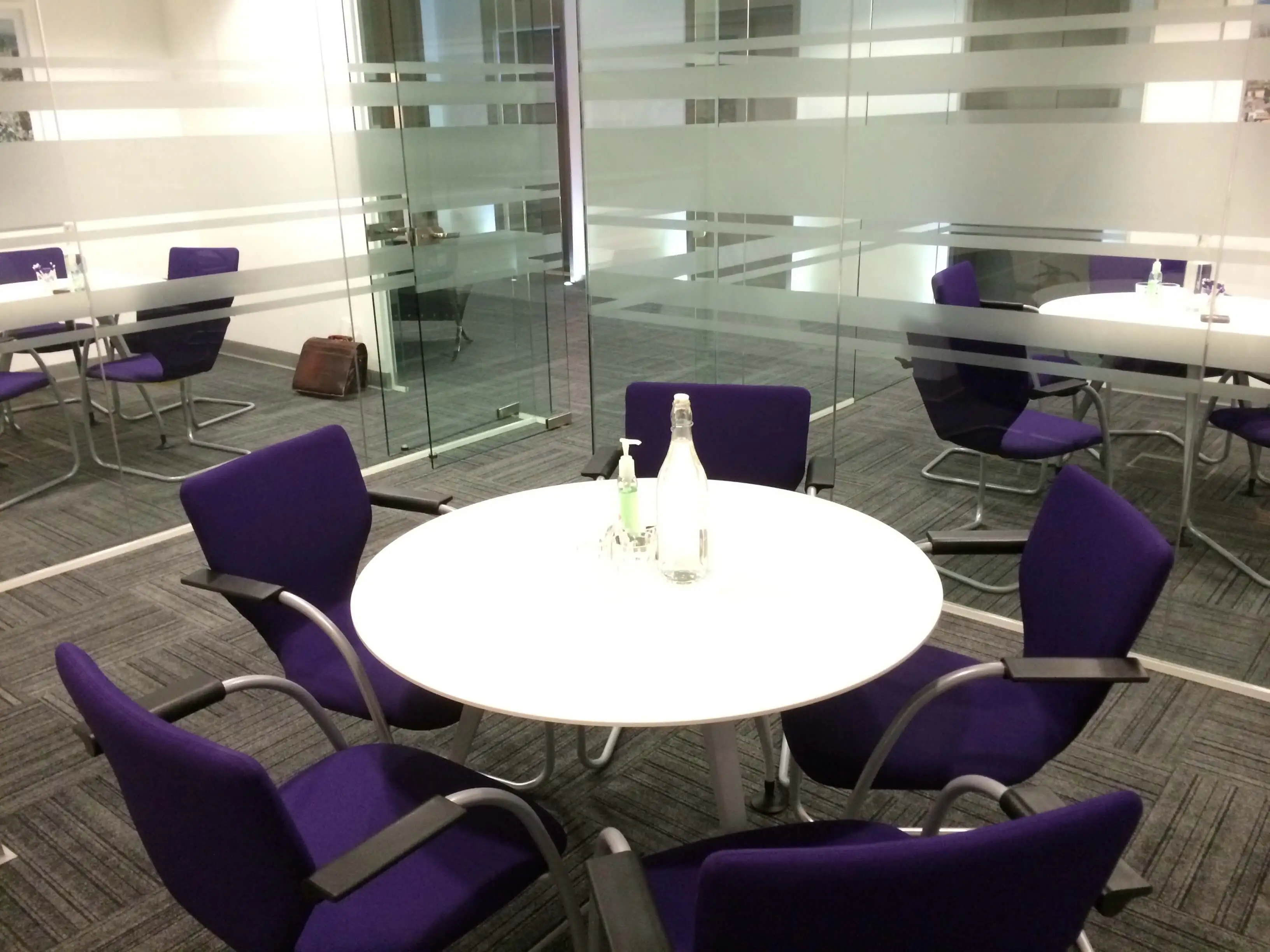 White round meeting table in the meeting space