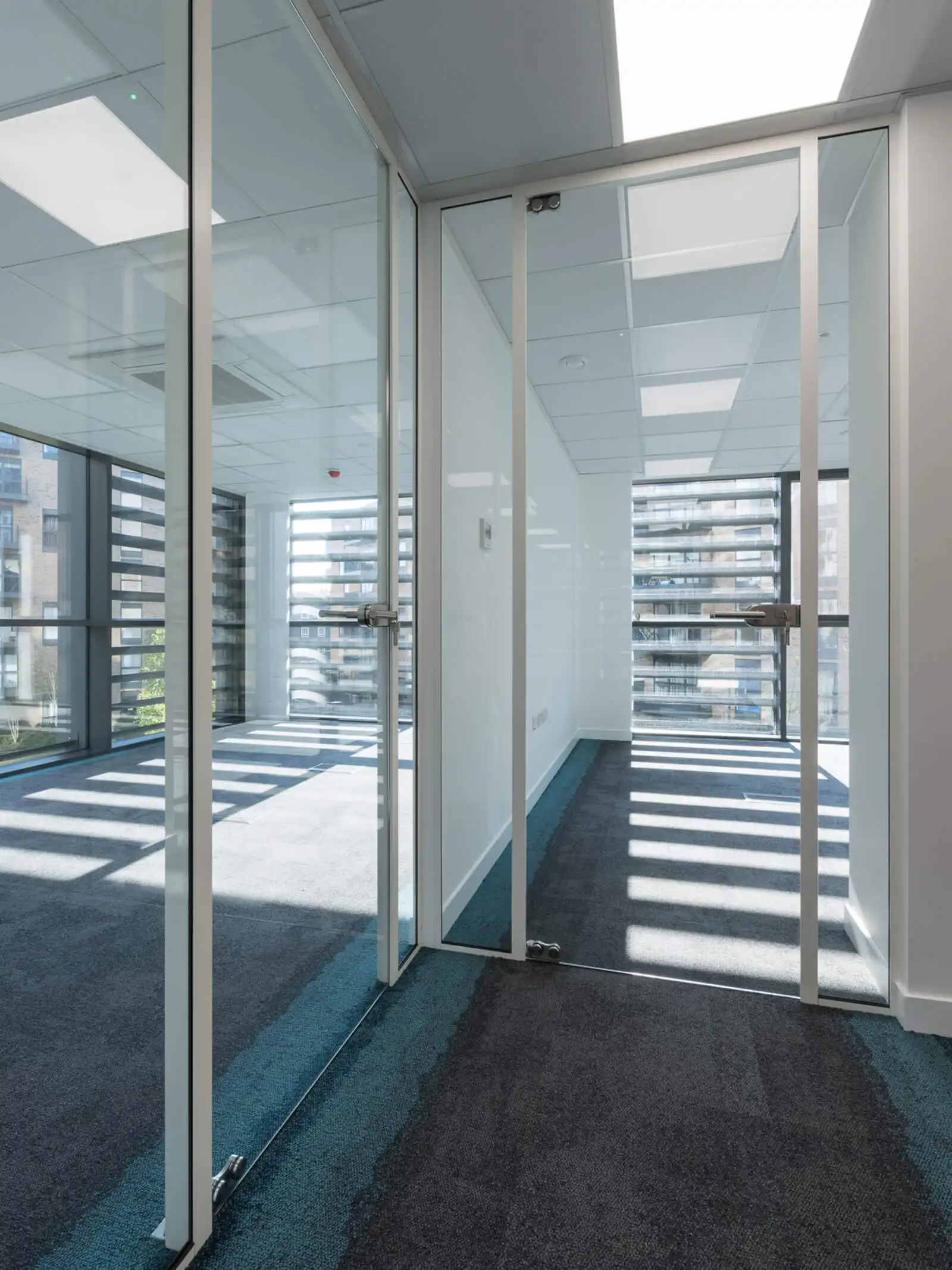 Framed glass doors in office