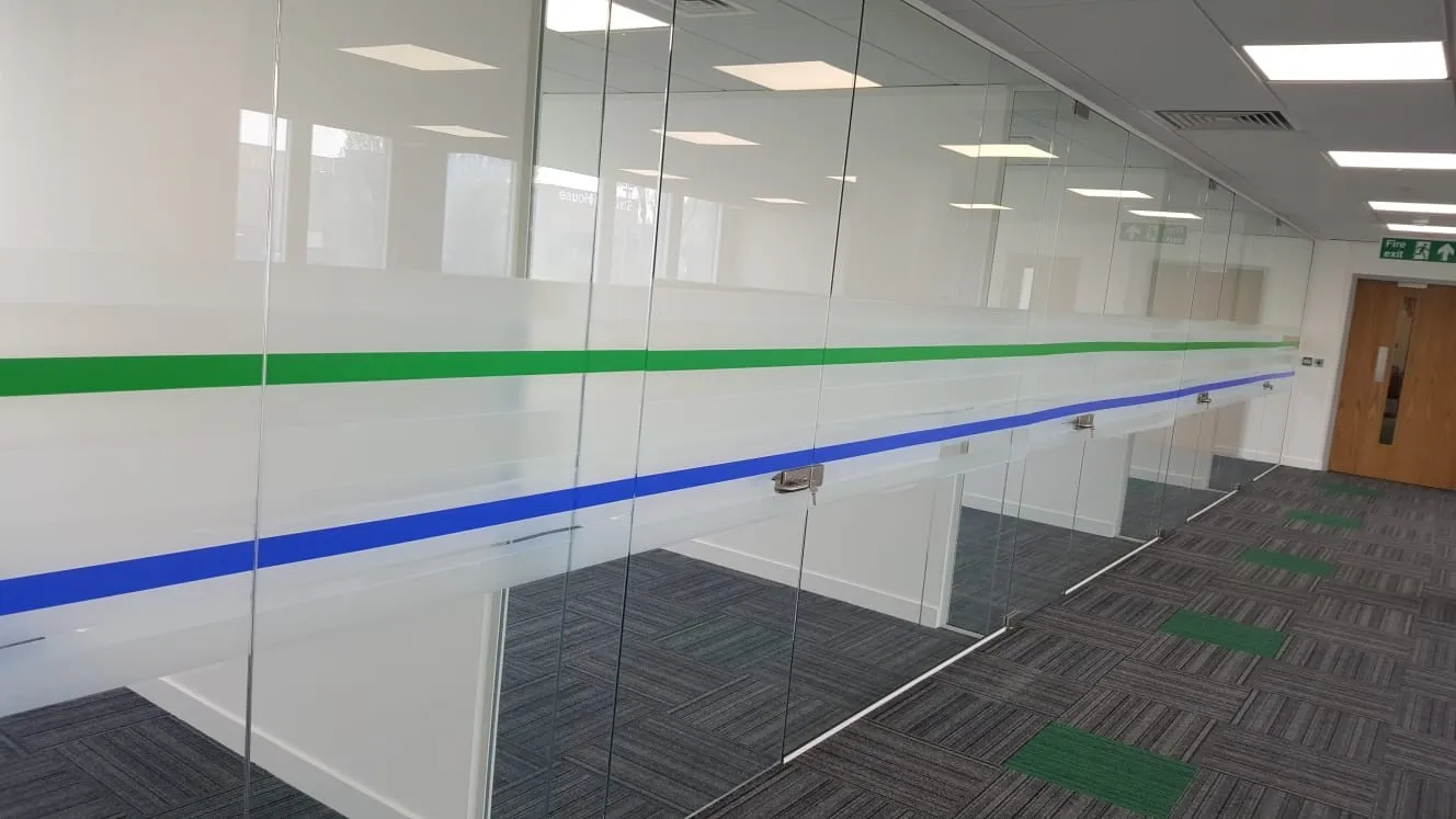 Frameless glass doors with manifested glass partitions