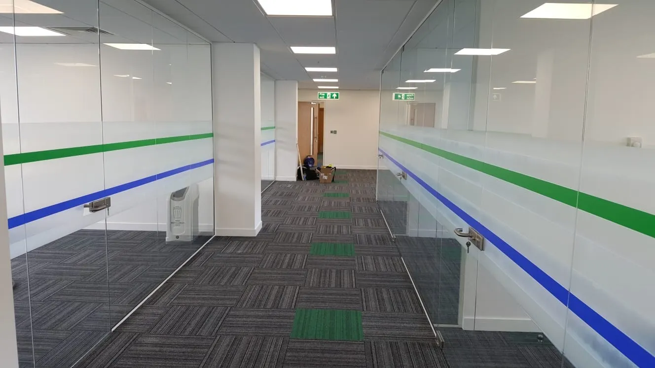 Manifested glass partitions with frameless glass doors