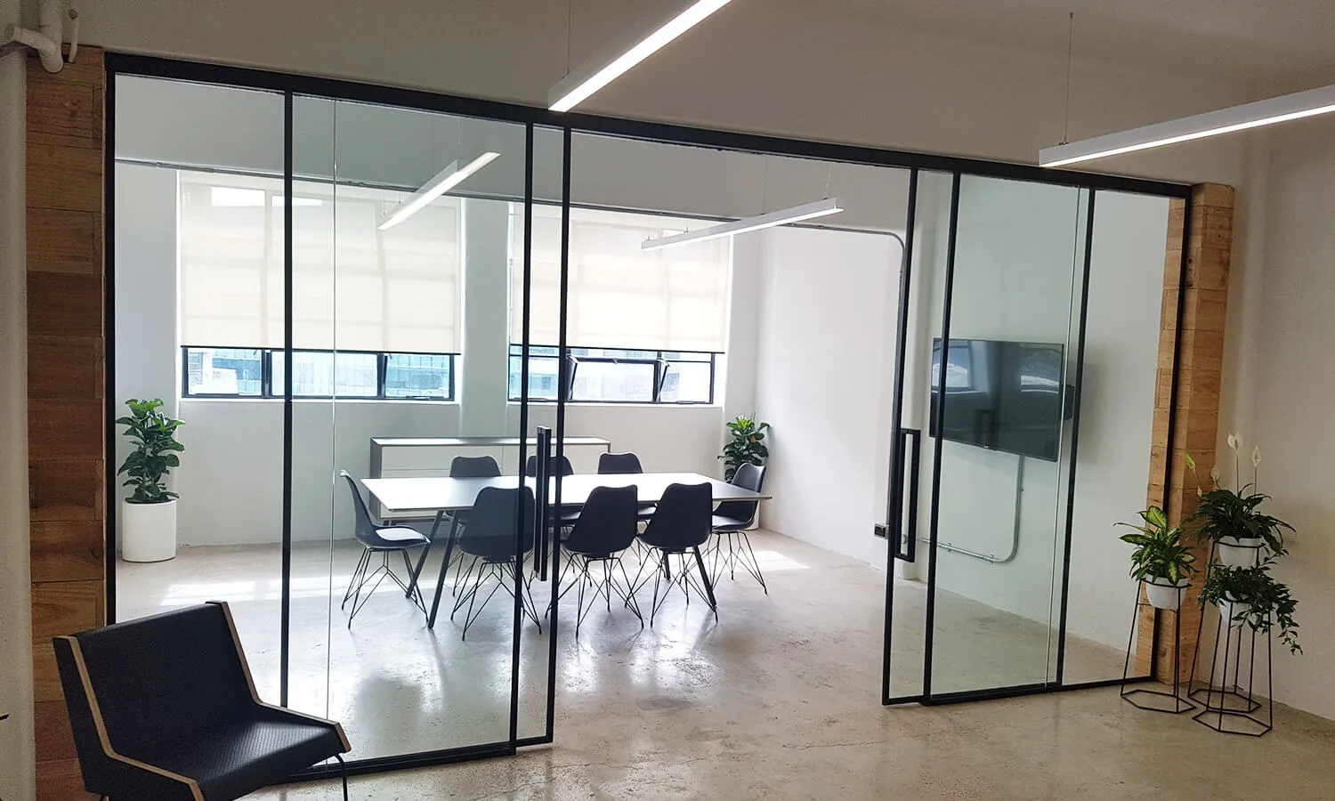 Meeting room with sliding glass doors