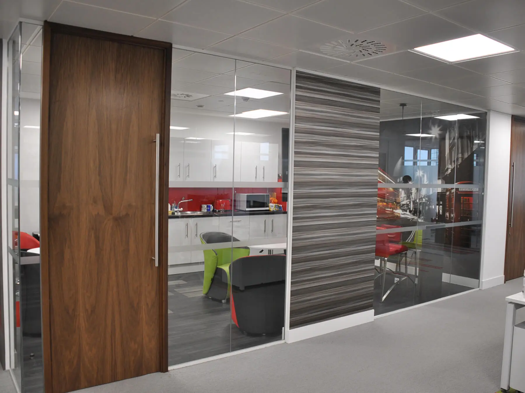 Office Breakout space with single glaze partitions with solid doors
