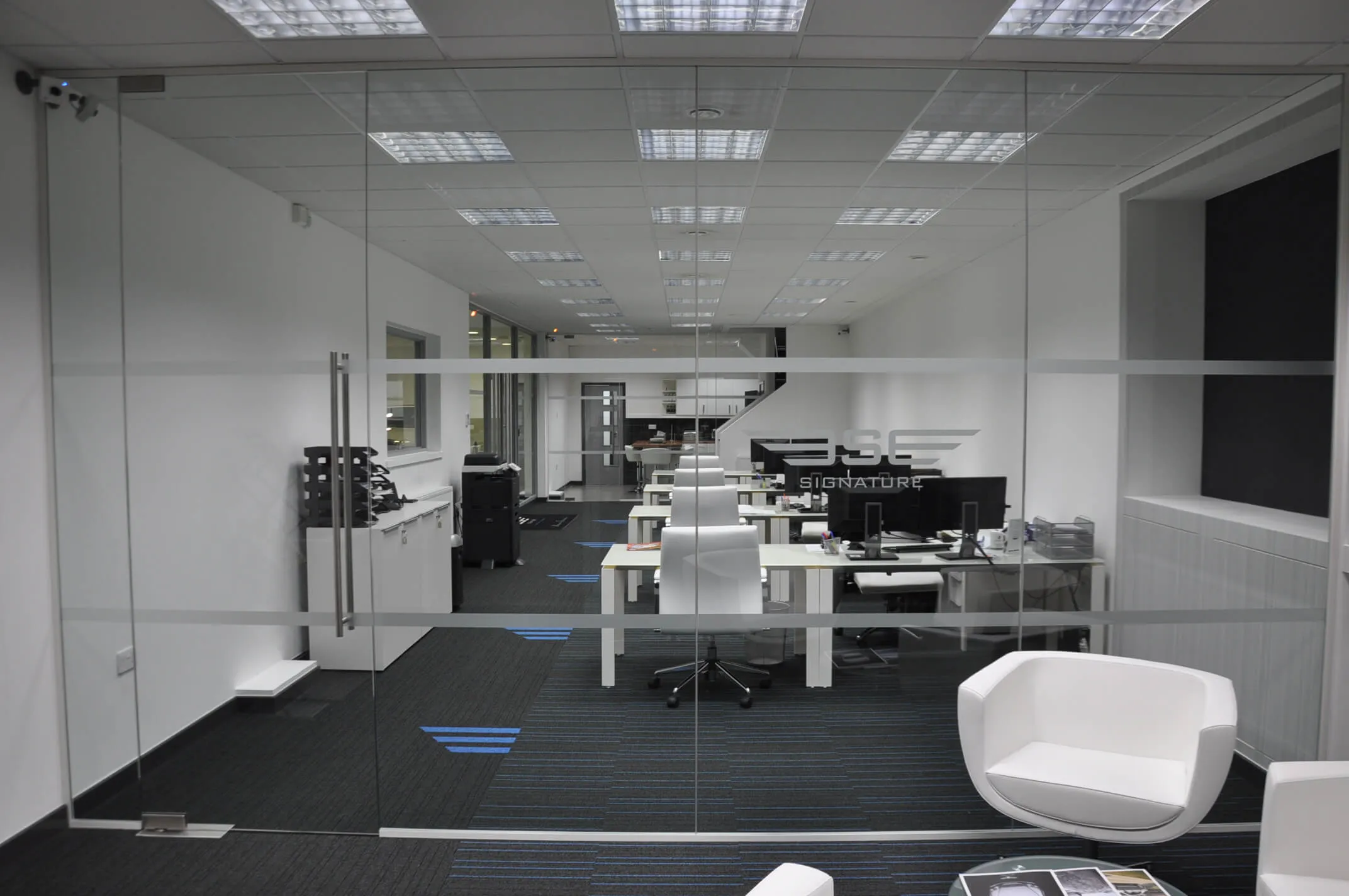 Office space with frameless glass doors